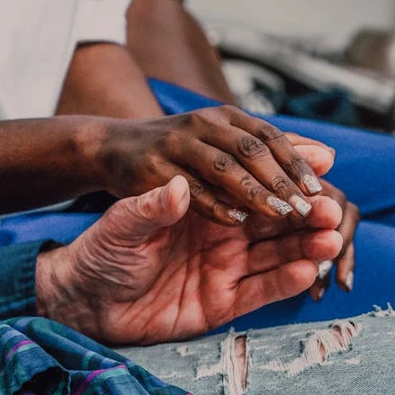 Community hands together